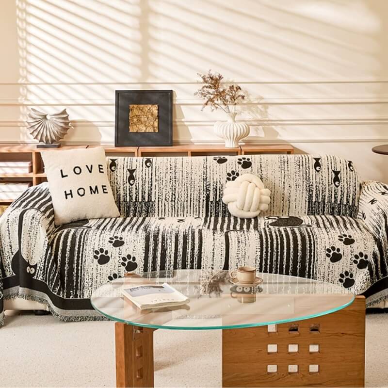 غطاء أريكة مضاد للانزلاق بنمط الأرجل – حماية وراحة 