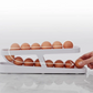 Compact egg holder for an organized refrigerator 