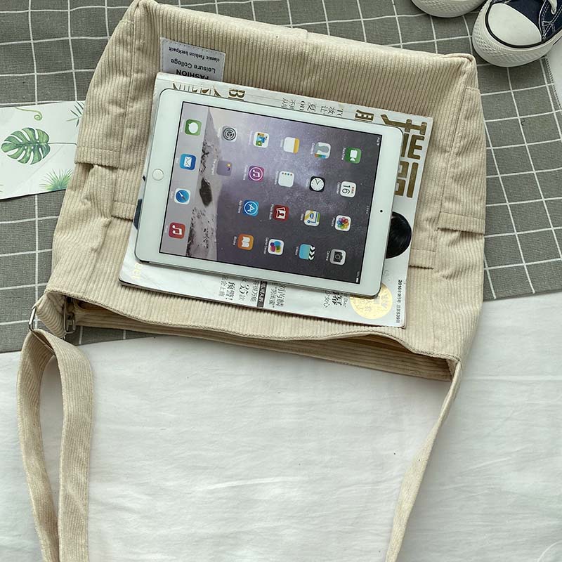 Slingtaske i kanvas - Afslappet og elegant stil 