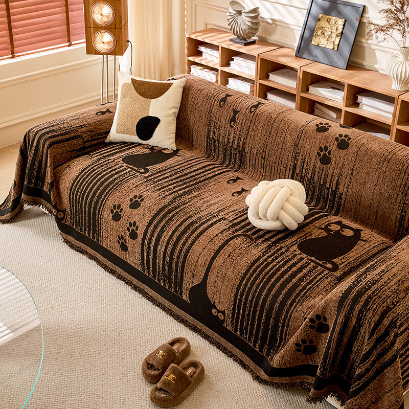 غطاء أريكة مضاد للانزلاق بنمط الأرجل – حماية وراحة 